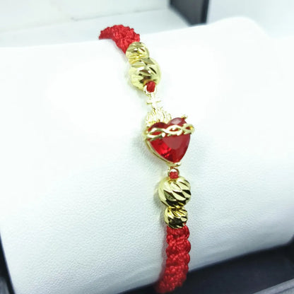 PULSERA CORAZON DE JESUS TEJIDA A MANO