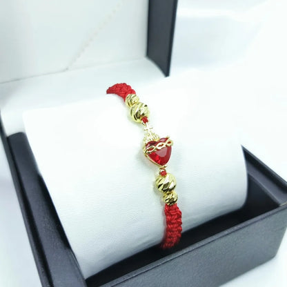 PULSERA CORAZON DE JESUS TEJIDA A MANO