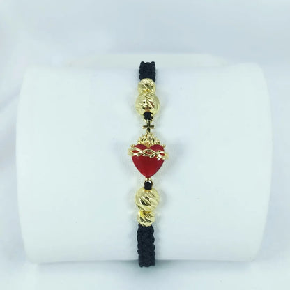 PULSERA CORAZON DE JESUS TEJIDA A MANO